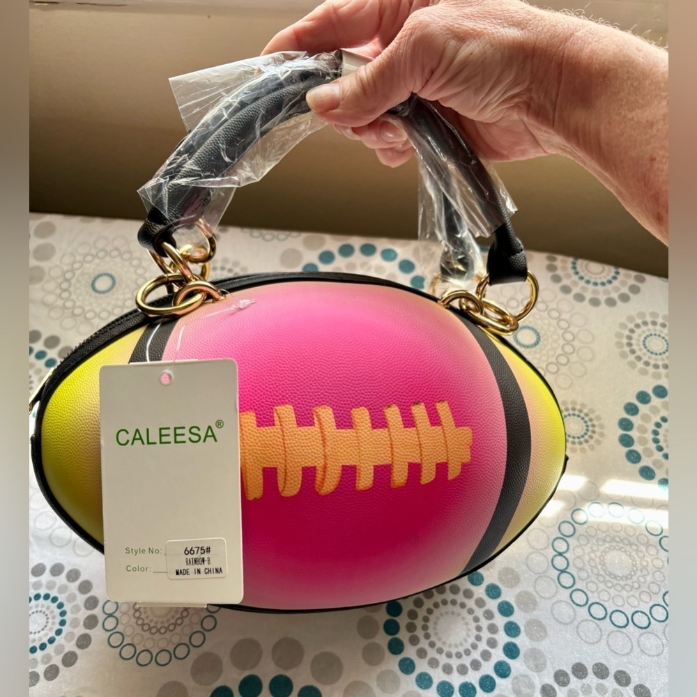 NWT-Football Shaped Purse
Fun Shoulder Bag Crossbody
Gold chain hardware - Picture 7 of 8